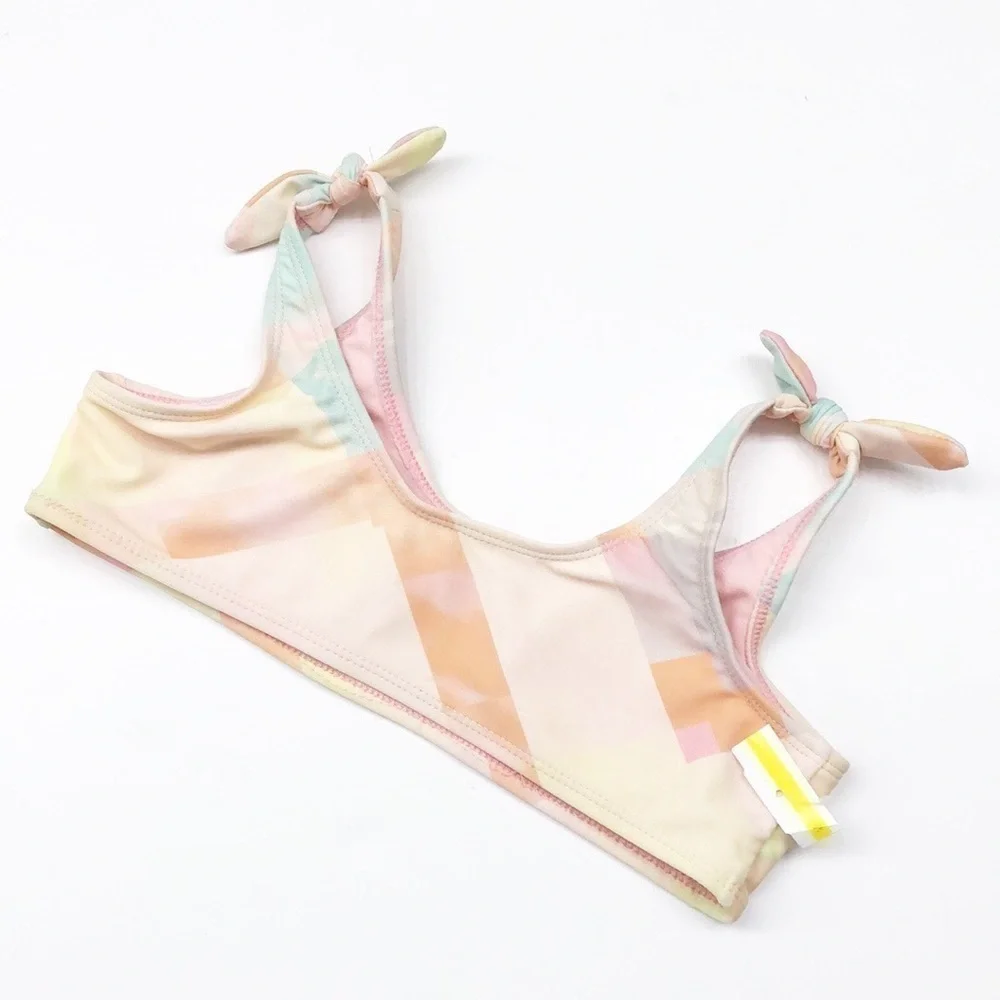 Pastel geometric print swim top for girls